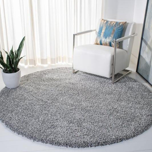 Tapis SAFAVIEH Evolution Shag Fransien uni de 4,6 cm d'épaisseur