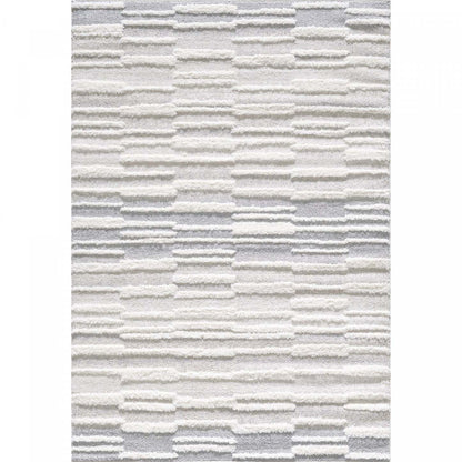 Lola Ajor Cream Shag Area Rug - 6'7 x 9'6|Carpette à poil long Lola Ajor crème - 6 pi 7 po x 9 pi 6 po