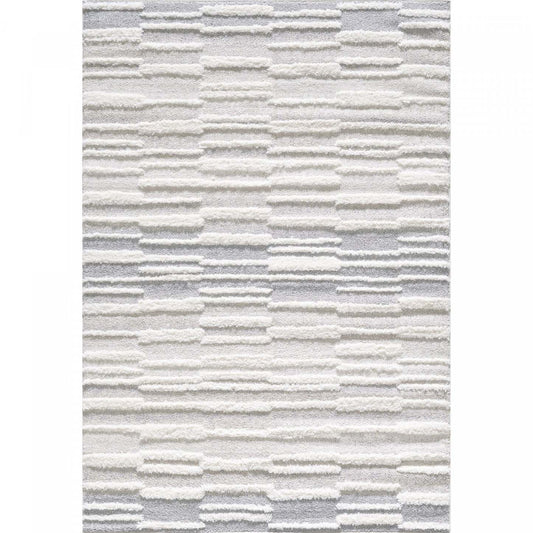 Lola Ajor Cream Shag Area Rug - 6'7 x 9'6|Carpette à poil long Lola Ajor crème - 6 pi 7 po x 9 pi 6 po