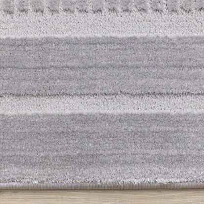 Ellie High-Low Texturé Soft Polyester Grey Border Area Rug - 7'10 x 10'6|Carpette à poil long et court Ellie en polyester doux texturé à bordure grise - 7 pi 10 po x 10 pi 6 po