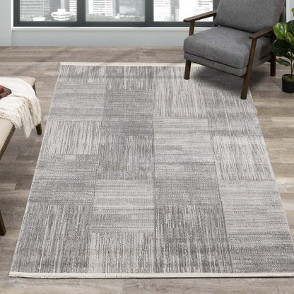 Tapis Eva à motif carrés de vieillis et à franges - 5 pi 3 po x 7 pi 3 po