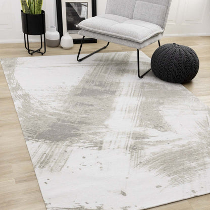 Kylie Soft Cream Taupe Brush Strokes Area Rug - 7'10 x 10'10|Carpette douce Kylie crème et taupe à motif de coups de pinceau - 7 pi 10 po x 10 pi 10 po