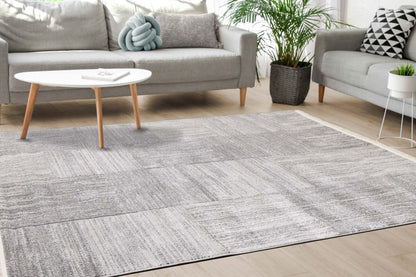 Tapis Eva à motif carrés de vieillis et à franges - 5 pi 3 po x 7 pi 3 po
