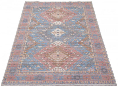 Tapis Samia bleu clair 5 pi 3 po x 8 pi 0 po