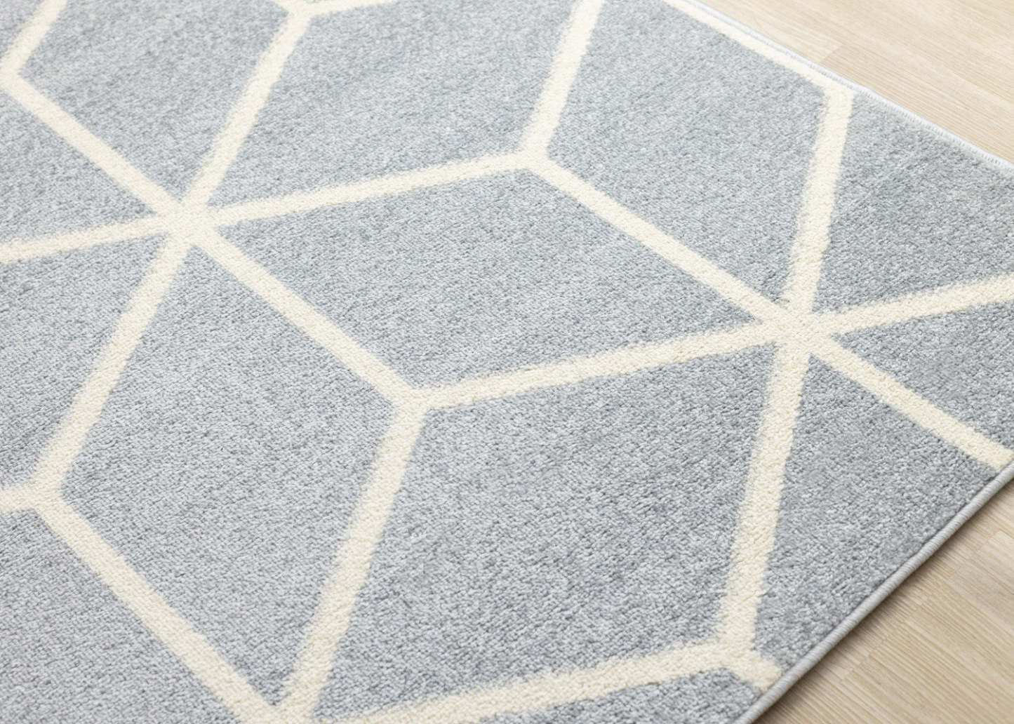 Tapis moderne géométrique bleu crème Ellis - 7'10 x 10'6|Carpette Ellis bleue et crème à motif géométrique moderne - 7 pi 10 po x 10 pi 6 po