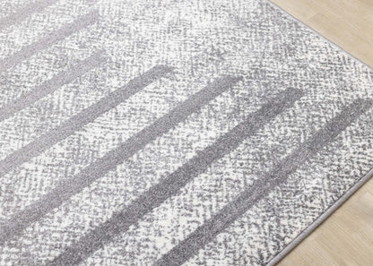 Covington Distressed Geometric Lines Indoor Area Rug - 5'3 x 7'7|Tapis d'intérieur Covington à motifs de lignes géométriques vieillies - 5 pi 3 po x 7 pi 7 po