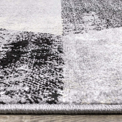 Carpette Covington à motifs de triangles vieillis - 7 pi 10 po x 10 pi 6 po