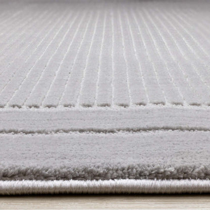 Ellie High-Low Texturé Soft Polyester Grey Border Area Rug - 7'10 x 10'6|Carpette à poil long et court Ellie en polyester doux texturé à bordure grise - 7 pi 10 po x 10 pi 6 po