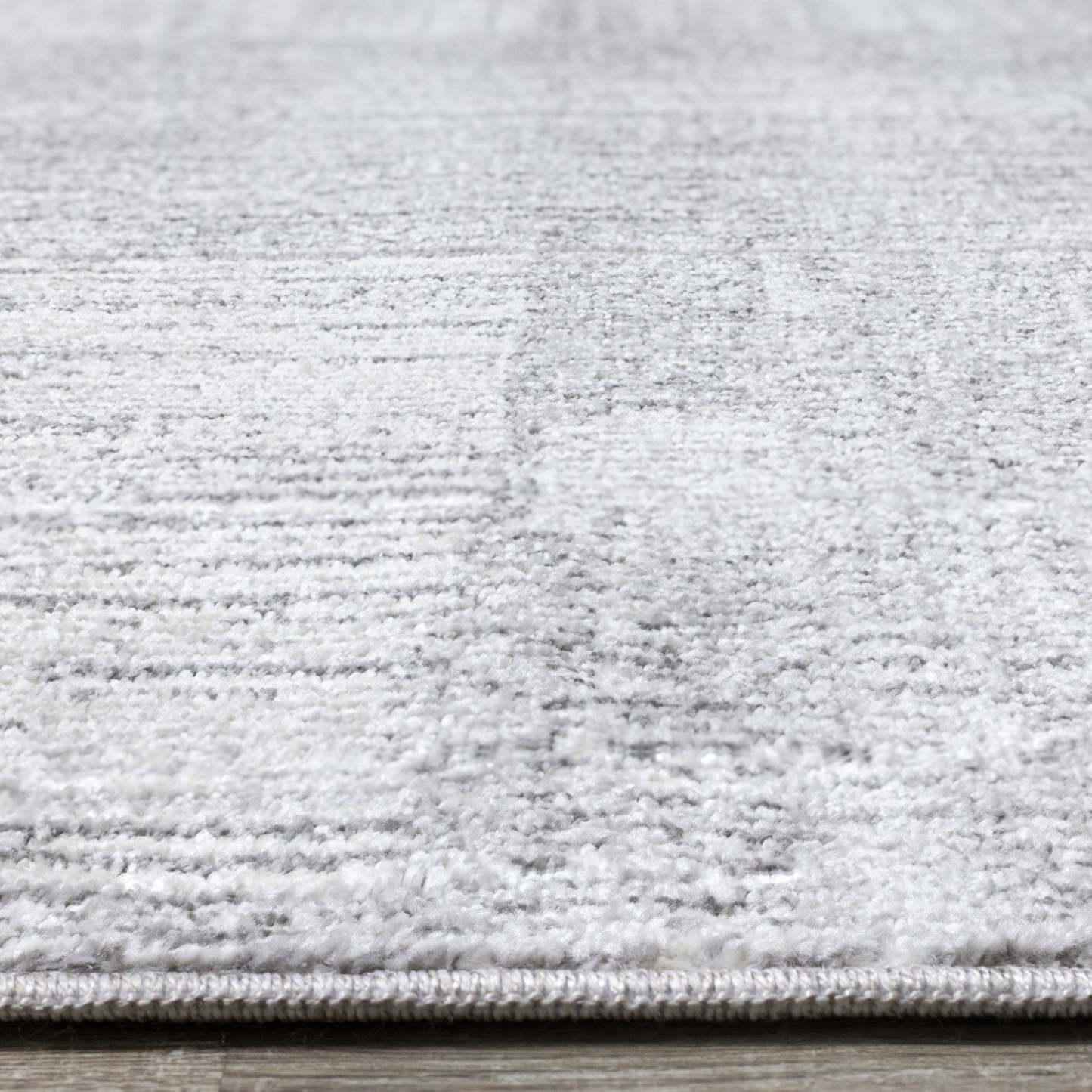 Tapis Eva à motif carrés de vieillis et à franges - 5 pi 3 po x 7 pi 3 po