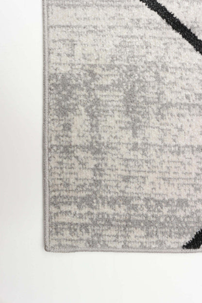 Tapis Damali ivoire/noir lavable en machine - 2'6 x 8'0|Carpette Damali ivoire et noire lavable à la machine - 2 pi 6 po x 8 pi 0 po|D86F17IZ