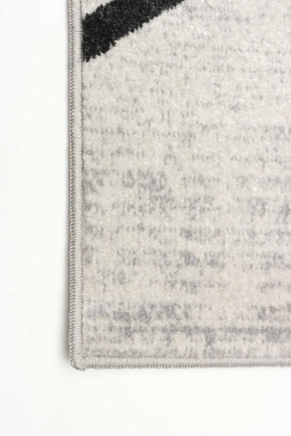 Tapis Damali ivoire/noir lavable en machine - 3'0 x 5'0|Carpette Damali ivoire et noire lavable à la machine - 3 pi 0 po x 5 pi 0 po|D86F85CW