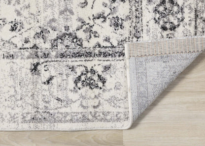 Tapis Sutton Distressed Floral Traditional Area Rug - 7'10 x 10'10|Carpette Sutton à motif floral traditionnel vieilli - 7 pi 10 po x 10 pi 10 po