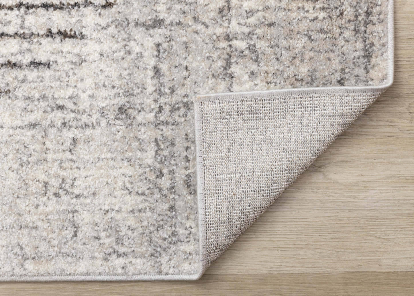 Carpette à poil court doux Solace grise et blanche à motif de cercles qui fusionnent - 6 pi 7 po x 9 pi 6 po