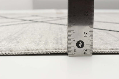 Tapis Damali ivoire/noir lavable en machine - 2'6 x 8'0|Carpette Damali ivoire et noire lavable à la machine - 2 pi 6 po x 8 pi 0 po|D86F17IZ