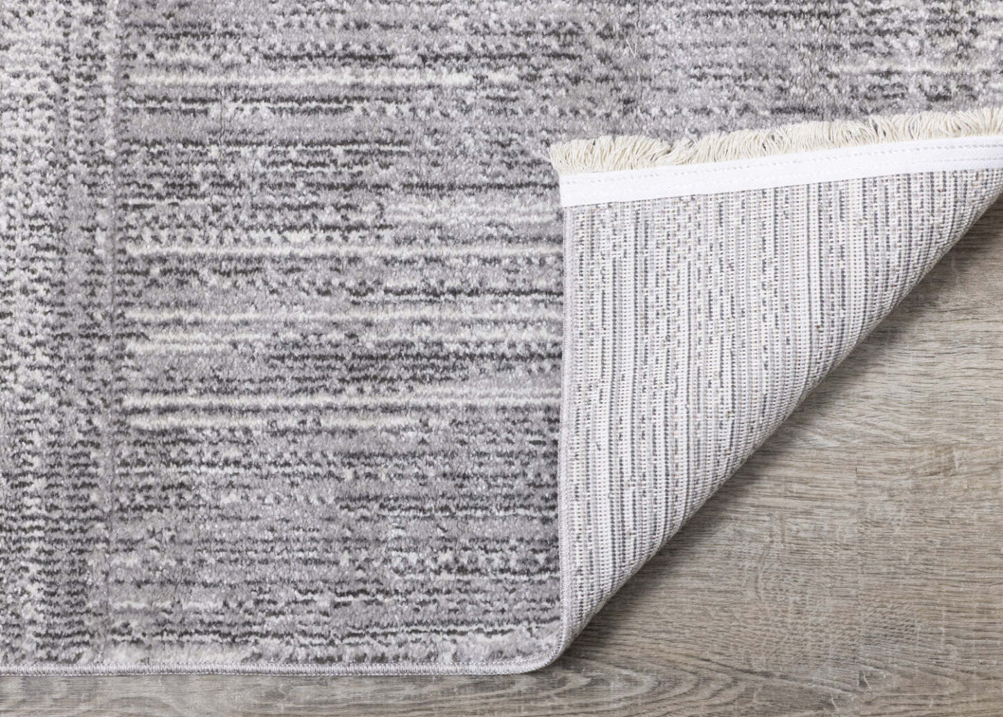 Tapis Eva à motif carrés de vieillis et à franges - 5 pi 3 po x 7 pi 3 po