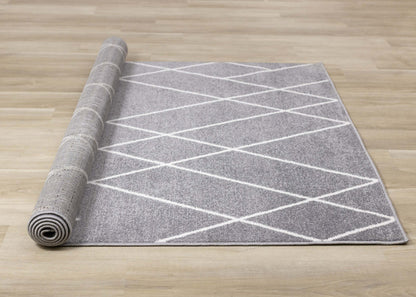 Carpette Covington à motifs de lignes géométriques - 5 pi 3 po x 7 pi 7 po