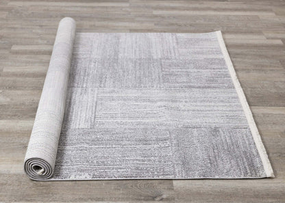 Tapis Eva à motif carrés de vieillis et à franges - 5 pi 3 po x 7 pi 3 po