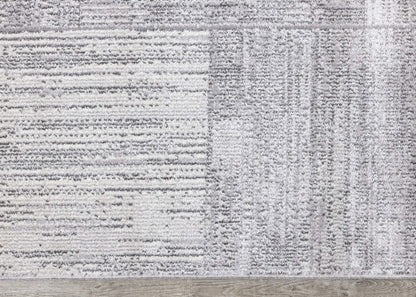 Tapis Eva à motif carrés de vieillis et à franges - 5 pi 3 po x 7 pi 3 po