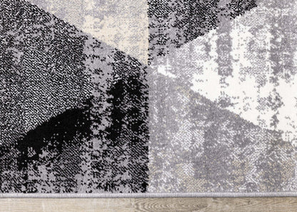 Covington Distressed Triangles Area Rug - 2'0 x 3'11|Tapis Covington à motifs de triangles vieillis - 2 pi x 3 pi 11 po