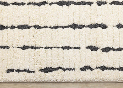 Teagan Plush Pile Cream Black Vertical Lines Area Rug - 5'3 x 7'7|Carpette à poil moelleux Teagan crème et noire à motif de rayures verticales - 5 pi 3 po x 7 pi 7 po