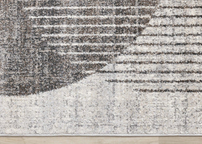 Carpette à poil court doux Solace grise et blanche à motif de cercles qui fusionnent - 5 pi 3 po x 7 pi 7 po