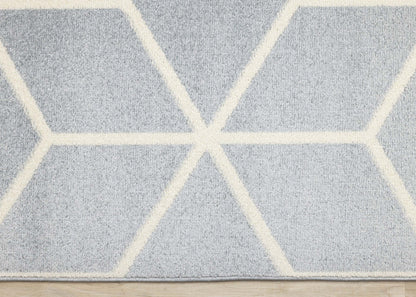 Tapis Ellis Modern géométrique bleu crème - 5'3 x 7'7|Tapis Ellis bleu et crème à motif géométrique moderne - 5 pi 3 po x 7 pi 7 po