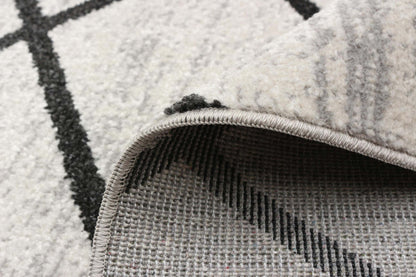 Tapis Damali ivoire/noir lavable en machine - 2'6 x 8'0|Carpette Damali ivoire et noire lavable à la machine - 2 pi 6 po x 8 pi 0 po|D86F17IZ