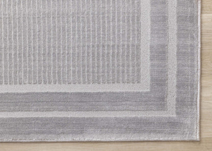 Ellie High-Low Texturé Soft Polyester Grey Border Area Rug - 7'10 x 10'6|Carpette à poil long et court Ellie en polyester doux texturé à bordure grise - 7 pi 10 po x 10 pi 6 po
