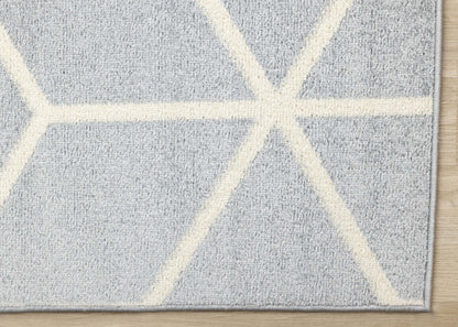 Tapis moderne géométrique bleu crème Ellis - 7'10 x 10'6|Carpette Ellis bleue et crème à motif géométrique moderne - 7 pi 10 po x 10 pi 6 po