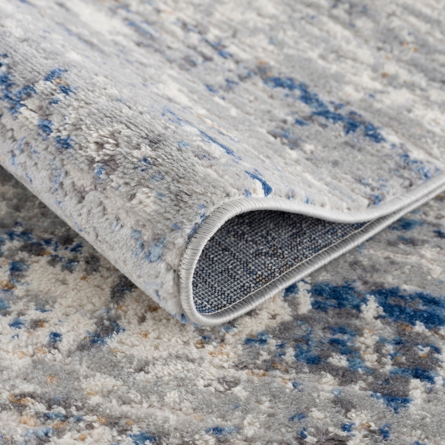 Tapis abstrait bleu/crème Madison Park Marie