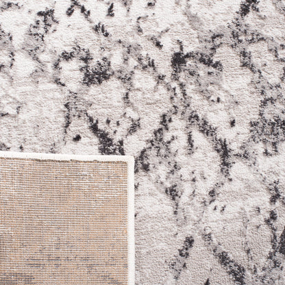 SAFAVIEH Tapis moderne vieilli en treillis Amelia Selvete