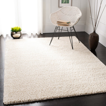 Tapis SAFAVIEH August Wilhelma Shag uni de 3 cm d'épaisseur