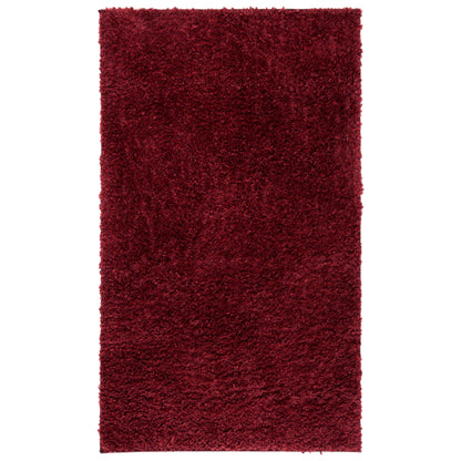 Tapis SAFAVIEH August Wilhelma Shag uni de 3 cm d'épaisseur