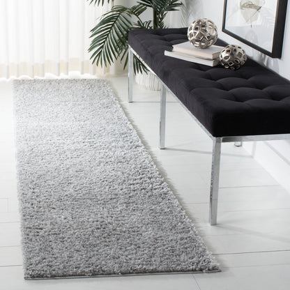 Tapis SAFAVIEH August Wilhelma Shag uni de 3 cm d'épaisseur