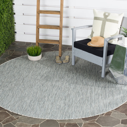 Tapis de patio/jardin imperméable SAFAVIEH Courtyard Begajeta pour intérieur/extérieur.