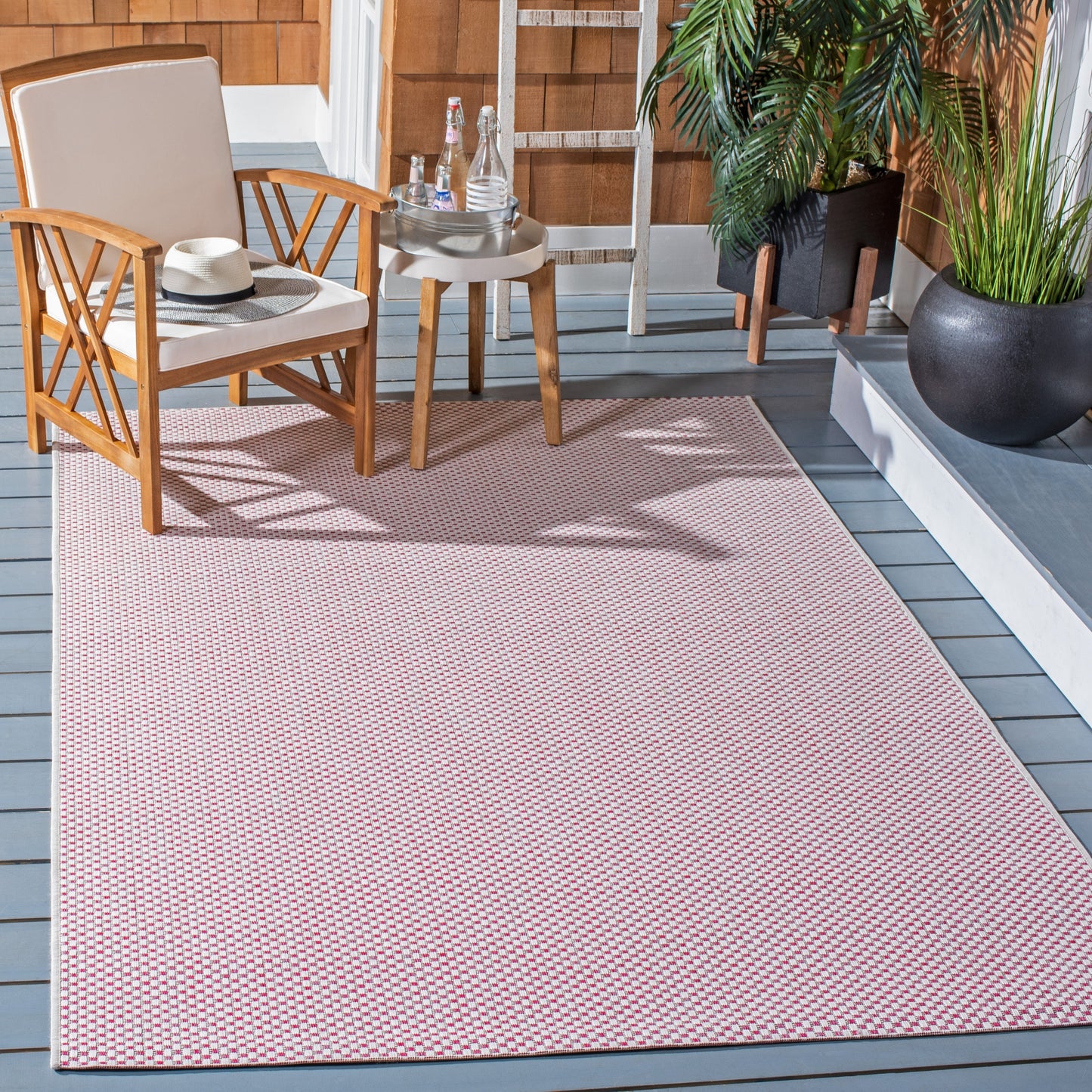 Tapis de patio/jardin imperméable SAFAVIEH Courtyard Begajeta pour intérieur/extérieur.