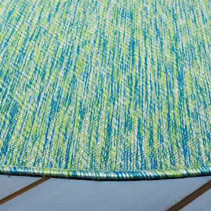 Tapis de patio/jardin imperméable SAFAVIEH Courtyard Begajeta pour intérieur/extérieur.