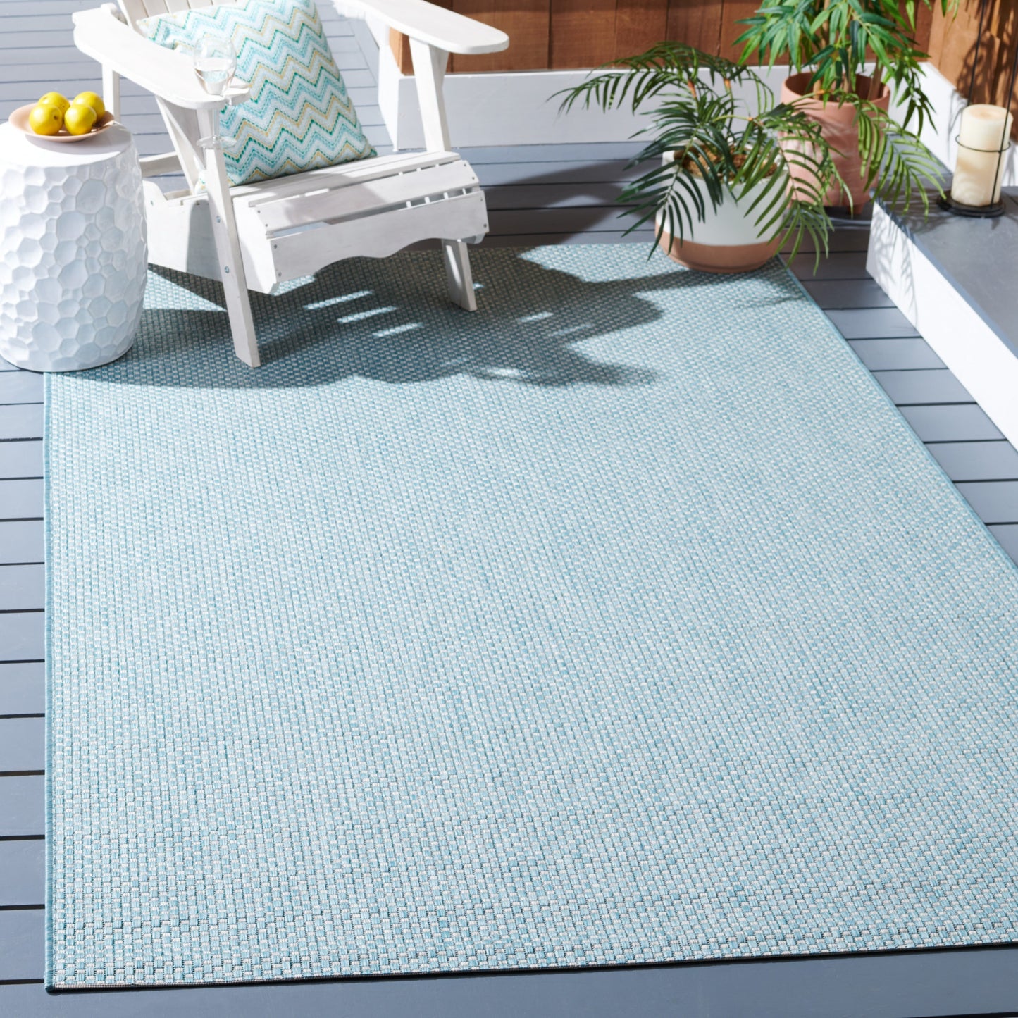 Tapis de patio/jardin imperméable SAFAVIEH Courtyard Begajeta pour intérieur/extérieur.