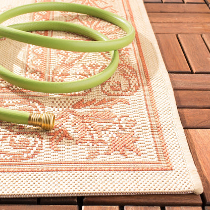 Tapis de jardin imperméable SAFAVIEH Courtyard Hendrina pour intérieur/extérieur