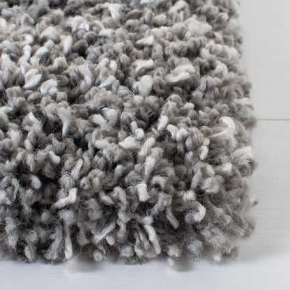 Tapis SAFAVIEH Evolution Shag Fransien uni de 4,6 cm d'épaisseur