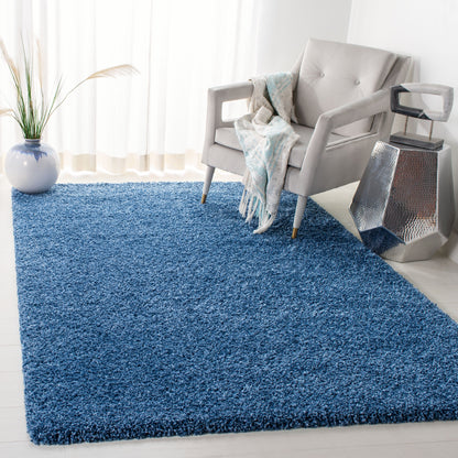 Tapis SAFAVIEH Evolution Shag Fransien uni de 4,6 cm d'épaisseur