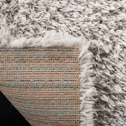 Tapis SAFAVIEH Flokati Shag Wynne de 7 cm d'épaisseur