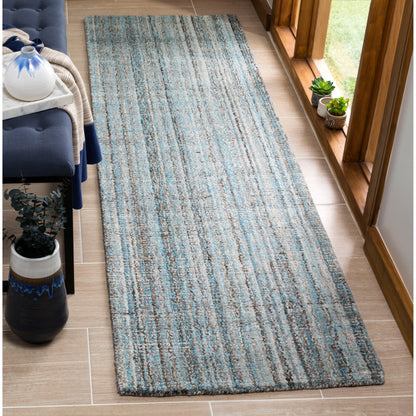 Tapis moderne en viscose SAFAVIEH fait main, motif abstrait corail