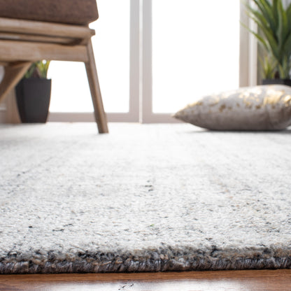 Tapis moderne en viscose SAFAVIEH fait main, motif abstrait corail