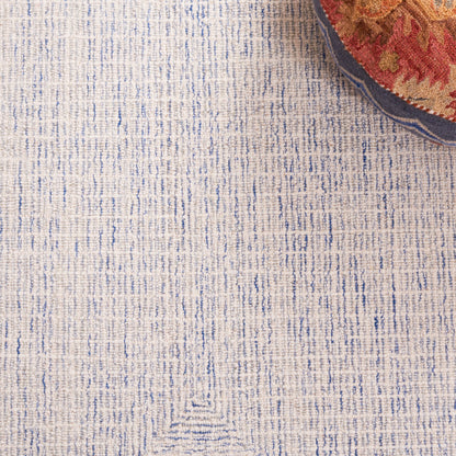 Tapis moderne en laine abstrait Maggy fait main SAFAVIEH