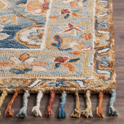Tapis en laine à pompons bohème SAFAVIEH fait main en tremble Kimm