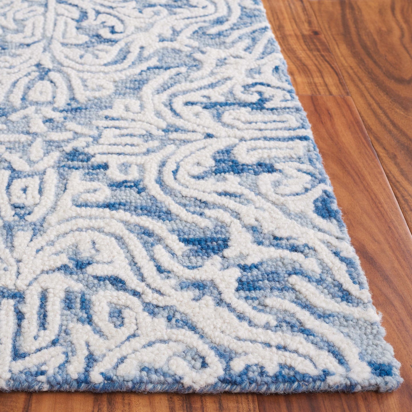 Tapis en laine moderne à motif floral Gertrida fait main SAFAVIEH