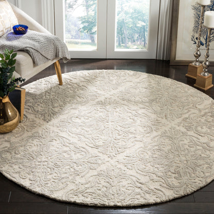 Tapis en laine moderne à motif floral Gertrida fait main SAFAVIEH