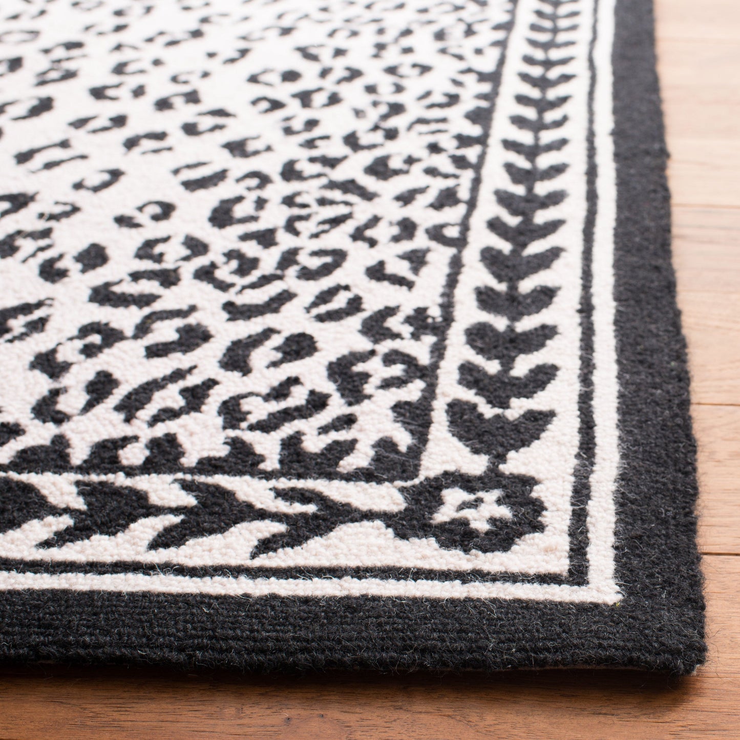 Tapis SAFAVIEH fait main Chelsea Solar Garden Leopard en laine de campagne française