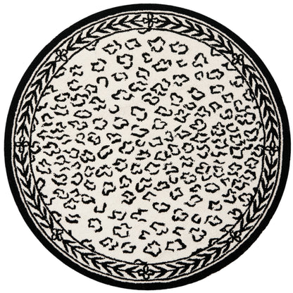 Tapis SAFAVIEH fait main Chelsea Solar Garden Leopard en laine de campagne française